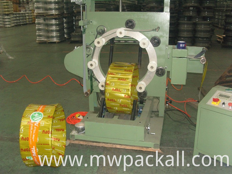 Wire rod coil ring wrapping machine